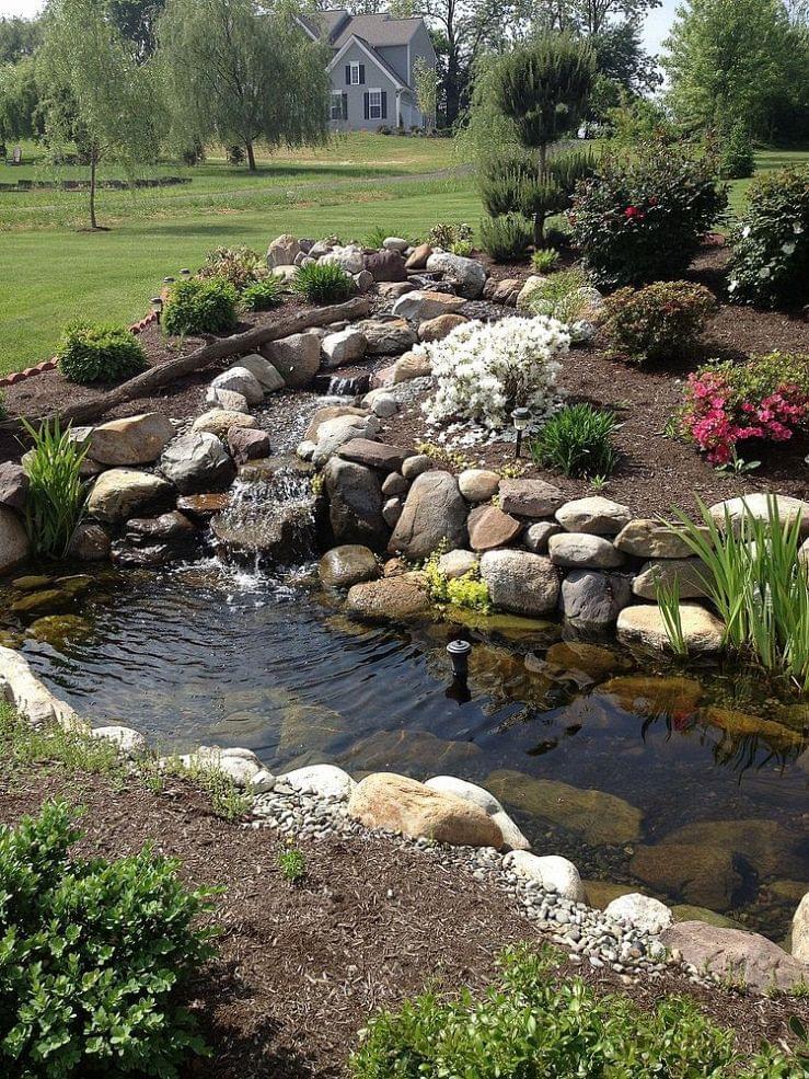 6c53fd1d561ccce5d5b475fe3f2f3e0c-2 Luxury backyard water feature with custom pond